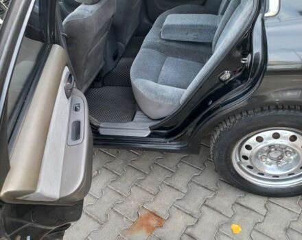 Чорний Кіа Маджентіс, об'ємом двигуна 2 л та пробігом 195 тис. км за 3500 $, фото 7 на Automoto.ua