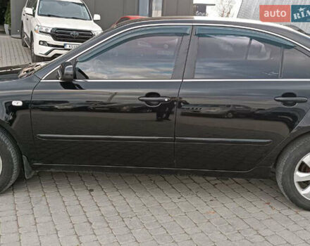 Чорний Кіа Маджентіс, об'ємом двигуна 2 л та пробігом 148 тис. км за 5450 $, фото 1 на Automoto.ua