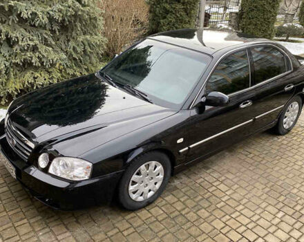 Чорний Кіа Маджентіс, об'ємом двигуна 2 л та пробігом 120 тис. км за 5800 $, фото 4 на Automoto.ua