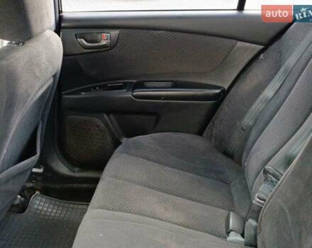 Чорний Кіа Маджентіс, об'ємом двигуна 2 л та пробігом 148 тис. км за 5450 $, фото 21 на Automoto.ua