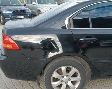 Чорний Кіа Маджентіс, об'ємом двигуна 2 л та пробігом 148 тис. км за 5450 $, фото 7 на Automoto.ua