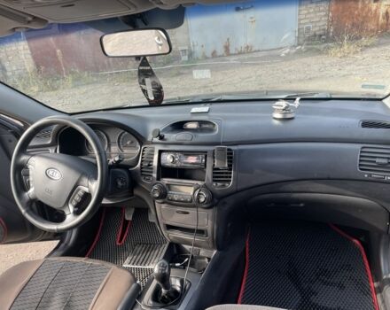 Чорний Кіа Маджентіс, об'ємом двигуна 2 л та пробігом 160 тис. км за 5900 $, фото 3 на Automoto.ua