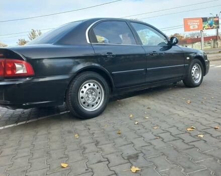 Черный Киа Маджентис, объемом двигателя 1.99 л и пробегом 195 тыс. км за 3200 $, фото 3 на Automoto.ua