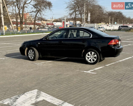 Черный Киа Маджентис, объемом двигателя 2 л и пробегом 260 тыс. км за 5400 $, фото 4 на Automoto.ua