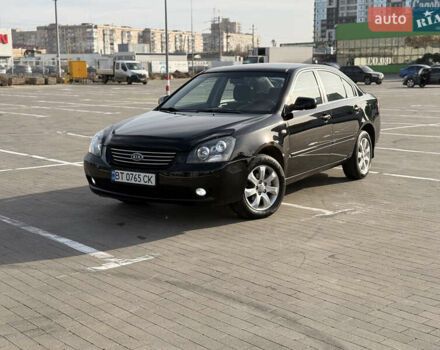 Черный Киа Маджентис, объемом двигателя 2 л и пробегом 260 тыс. км за 5400 $, фото 2 на Automoto.ua