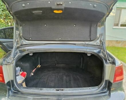 Черный Киа Маджентис, объемом двигателя 2 л и пробегом 240 тыс. км за 4150 $, фото 6 на Automoto.ua