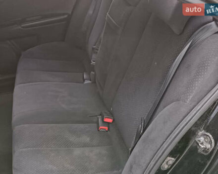 Чорний Кіа Маджентіс, об'ємом двигуна 2 л та пробігом 148 тис. км за 5450 $, фото 22 на Automoto.ua
