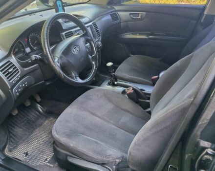 Черный Киа Маджентис, объемом двигателя 2 л и пробегом 240 тыс. км за 4150 $, фото 1 на Automoto.ua