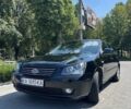 Черный Киа Маджентис, объемом двигателя 2 л и пробегом 238 тыс. км за 5500 $, фото 1 на Automoto.ua