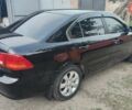 Черный Киа Маджентис, объемом двигателя 2 л и пробегом 200 тыс. км за 5200 $, фото 1 на Automoto.ua