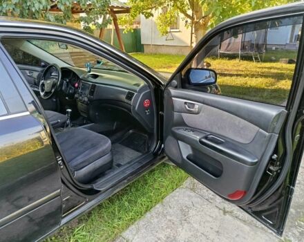 Черный Киа Маджентис, объемом двигателя 2 л и пробегом 240 тыс. км за 4150 $, фото 3 на Automoto.ua