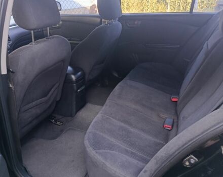 Черный Киа Маджентис, объемом двигателя 2 л и пробегом 240 тыс. км за 4150 $, фото 4 на Automoto.ua