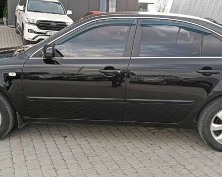 Чорний Кіа Маджентіс, об'ємом двигуна 2 л та пробігом 148 тис. км за 5450 $, фото 2 на Automoto.ua