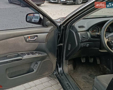 Чорний Кіа Маджентіс, об'ємом двигуна 2 л та пробігом 148 тис. км за 5450 $, фото 12 на Automoto.ua