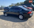 Черный Киа Маджентис, объемом двигателя 2 л и пробегом 260 тыс. км за 5199 $, фото 1 на Automoto.ua