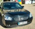 Чорний Кіа Маджентіс, об'ємом двигуна 2 л та пробігом 262 тис. км за 5603 $, фото 1 на Automoto.ua