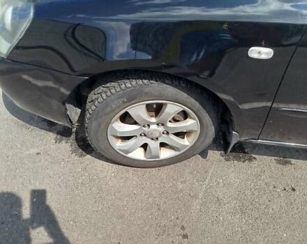 Черный Киа Маджентис, объемом двигателя 2 л и пробегом 265 тыс. км за 4800 $, фото 6 на Automoto.ua