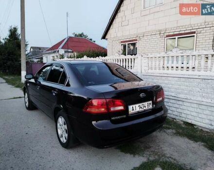 Черный Киа Маджентис, объемом двигателя 2 л и пробегом 180 тыс. км за 4850 $, фото 11 на Automoto.ua