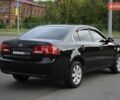 Черный Киа Маджентис, объемом двигателя 2 л и пробегом 296 тыс. км за 5950 $, фото 4 на Automoto.ua