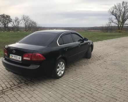 Кіа Маджентіс 2007 у Ромнах на Automoto.ua Чорний Кіа Маджентіс, об'ємом двигуна 2 л та пробігом 231 тис. км за 4900 $, фото 5 на Automoto.ua
