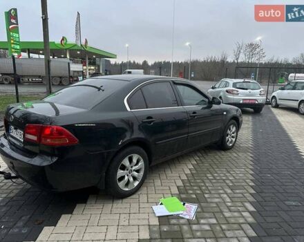 Чорний Кіа Маджентіс, об'ємом двигуна 2 л та пробігом 302 тис. км за 5800 $, фото 4 на Automoto.ua