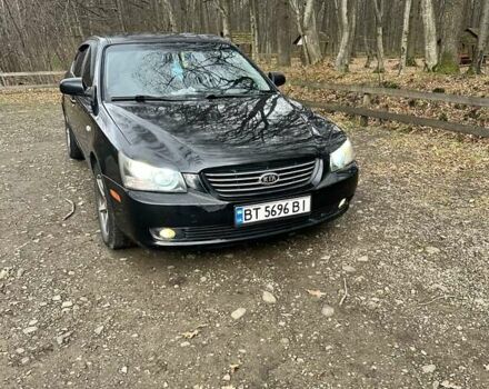 Чорний Кіа Маджентіс, об'ємом двигуна 2.66 л та пробігом 218 тис. км за 4600 $, фото 7 на Automoto.ua