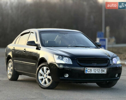 Черный Киа Маджентис, объемом двигателя 2 л и пробегом 305 тыс. км за 5400 $, фото 3 на Automoto.ua