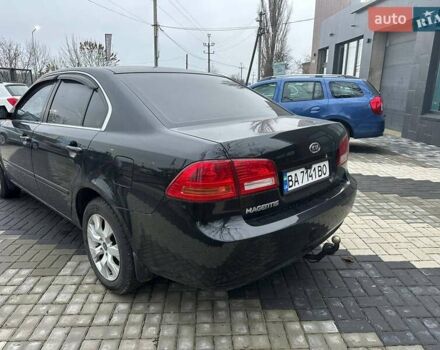 Чорний Кіа Маджентіс, об'ємом двигуна 2 л та пробігом 302 тис. км за 5800 $, фото 7 на Automoto.ua