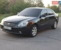 Черный Киа Маджентис, объемом двигателя 2 л и пробегом 230 тыс. км за 5200 $, фото 1 на Automoto.ua