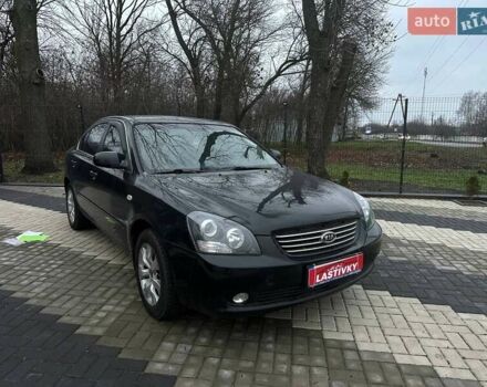 Чорний Кіа Маджентіс, об'ємом двигуна 2 л та пробігом 302 тис. км за 5800 $, фото 2 на Automoto.ua