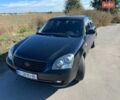 Черный Киа Маджентис, объемом двигателя 2 л и пробегом 232 тыс. км за 5500 $, фото 1 на Automoto.ua