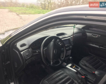 Кіа Маджентіс 2007 у Ромнах на Automoto.ua Чорний Кіа Маджентіс, об'ємом двигуна 2 л та пробігом 231 тис. км за 4900 $, фото 10 на Automoto.ua