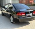 Черный Киа Маджентис, объемом двигателя 2 л и пробегом 267 тыс. км за 4900 $, фото 3 на Automoto.ua