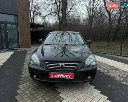 Чорний Кіа Маджентіс, об'ємом двигуна 2 л та пробігом 302 тис. км за 5800 $, фото 1 на Automoto.ua