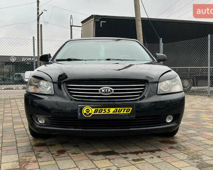 Чорний Кіа Маджентіс, об'ємом двигуна 2.66 л та пробігом 219 тис. км за 4600 $, фото 1 на Automoto.ua