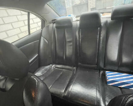 Черный Киа Маджентис, объемом двигателя 2 л и пробегом 366 тыс. км за 4000 $, фото 6 на Automoto.ua