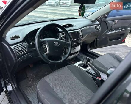Чорний Кіа Маджентіс, об'ємом двигуна 2 л та пробігом 302 тис. км за 5800 $, фото 14 на Automoto.ua