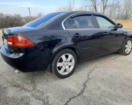 Чорний Кіа Маджентіс, об'ємом двигуна 2.7 л та пробігом 210 тис. км за 5300 $, фото 1 на Automoto.ua