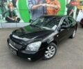 Чорний Кіа Маджентіс, об'ємом двигуна 2 л та пробігом 262 тис. км за 5900 $, фото 1 на Automoto.ua