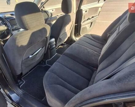 Чорний Кіа Маджентіс, об'ємом двигуна 2 л та пробігом 373 тис. км за 4500 $, фото 18 на Automoto.ua