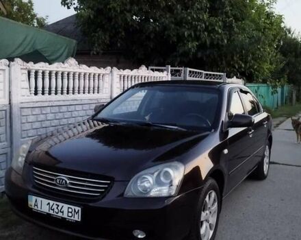 Черный Киа Маджентис, объемом двигателя 2 л и пробегом 180 тыс. км за 4850 $, фото 12 на Automoto.ua