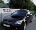 Черный Киа Маджентис, объемом двигателя 2 л и пробегом 180 тыс. км за 4850 $, фото 12 на Automoto.ua