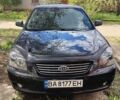 Черный Киа Маджентис, объемом двигателя 2 л и пробегом 237 тыс. км за 4900 $, фото 1 на Automoto.ua