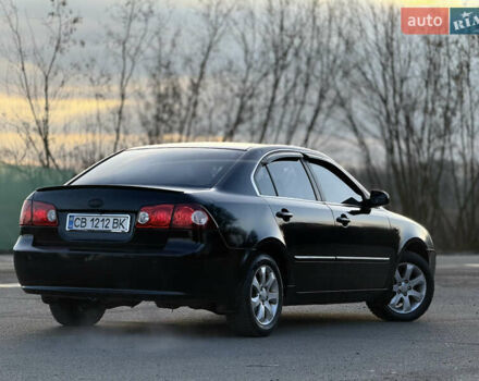 Черный Киа Маджентис, объемом двигателя 2 л и пробегом 305 тыс. км за 5400 $, фото 4 на Automoto.ua