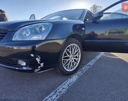 Чорний Кіа Маджентіс, об'ємом двигуна 2 л та пробігом 373 тис. км за 4500 $, фото 19 на Automoto.ua