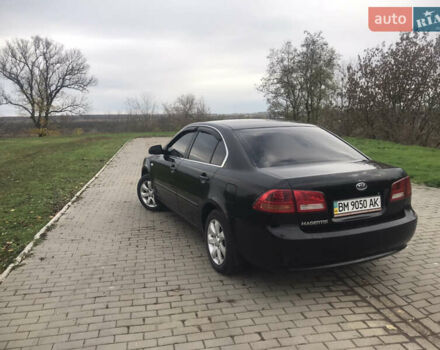 Кіа Маджентіс 2007 у Ромнах на Automoto.ua Чорний Кіа Маджентіс, об'ємом двигуна 2 л та пробігом 231 тис. км за 4900 $, фото 6 на Automoto.ua