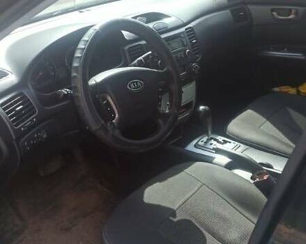 Черный Киа Маджентис, объемом двигателя 2 л и пробегом 322 тыс. км за 5000 $, фото 3 на Automoto.ua