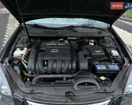 Чорний Кіа Маджентіс, об'ємом двигуна 2 л та пробігом 302 тис. км за 5800 $, фото 37 на Automoto.ua