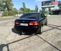 Черный Киа Маджентис, объемом двигателя 2 л и пробегом 188 тыс. км за 6999 $, фото 1 на Automoto.ua