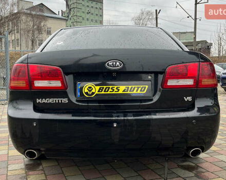 Чорний Кіа Маджентіс, об'ємом двигуна 2.66 л та пробігом 219 тис. км за 4600 $, фото 5 на Automoto.ua
